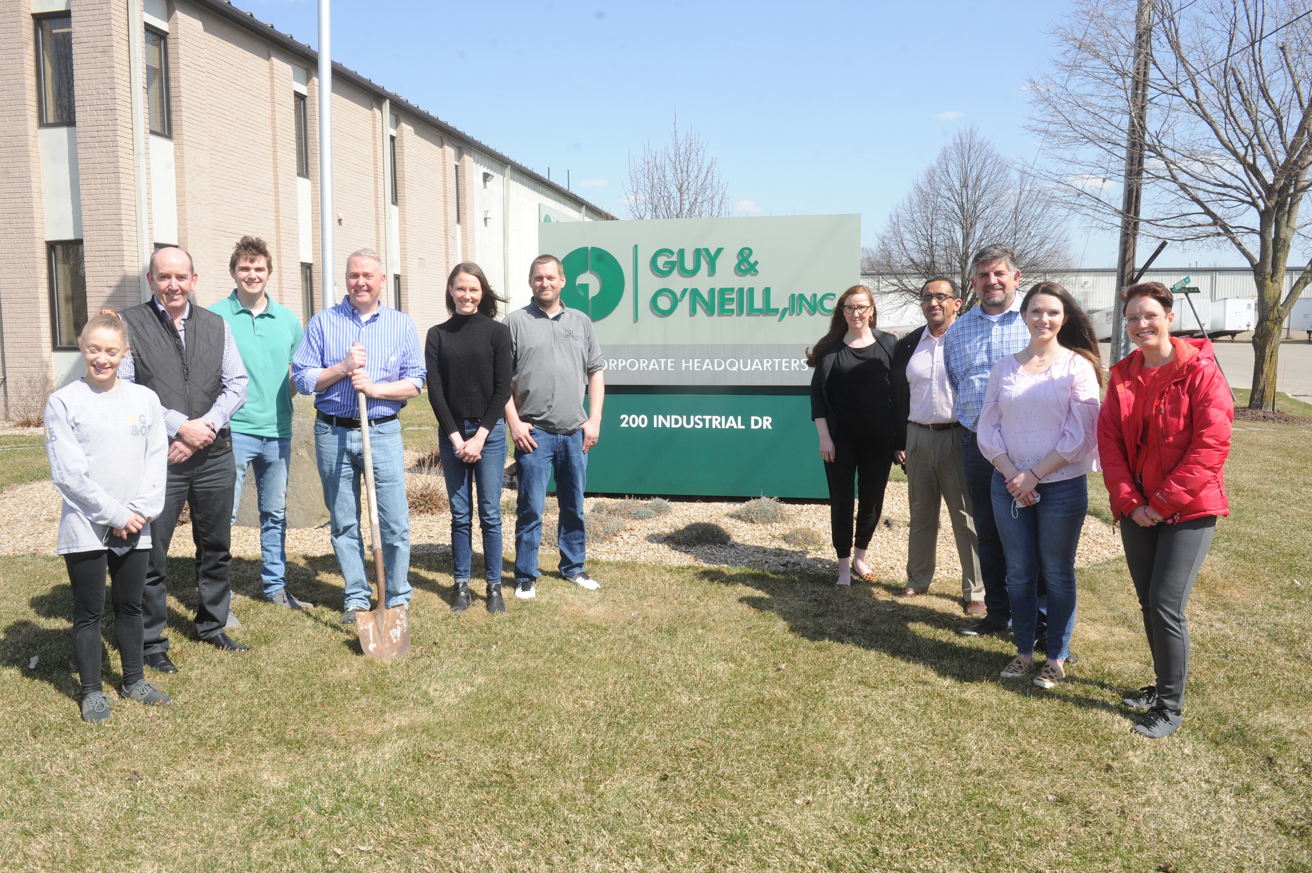 Proud Guy & O'Neill employees standing at 200 Industrial Drive, Fredonia, WI